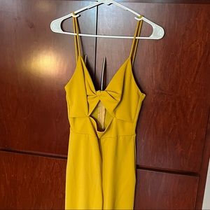 Mustard yellow jumpsuit.